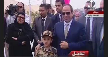 Photo of ابن الشهيد يرفع الستار عن لوحة افتتاح كوبرى البطل أحمد منسى